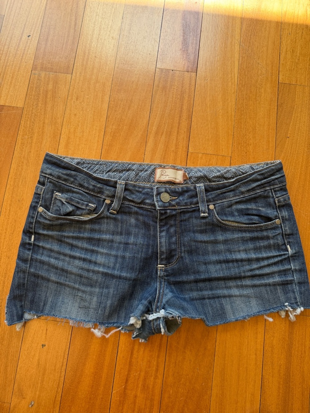 PAIGE Dark Blue Distressed Denim Cutoff Shorts